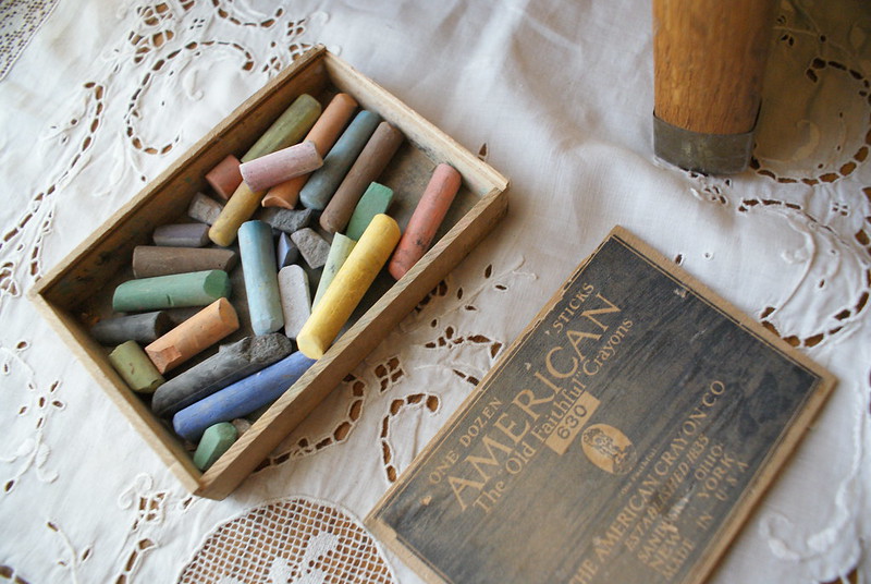 A picture of a box of colorful chalk, circa 1900, on display in Rosson House.