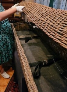 A picture of the wicker casket from the Heritage Square collection.