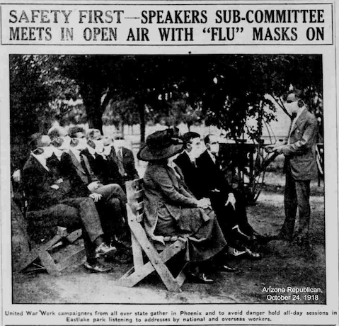 A newspaper clipping from October 1918, showing a committee meeting outside and wearing masks for safety during the influenza epidemic.