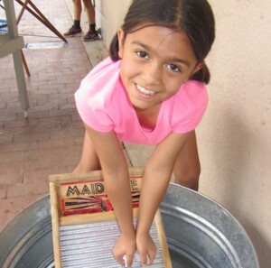 A picture of a child doing field trip activities at Heritage Square.