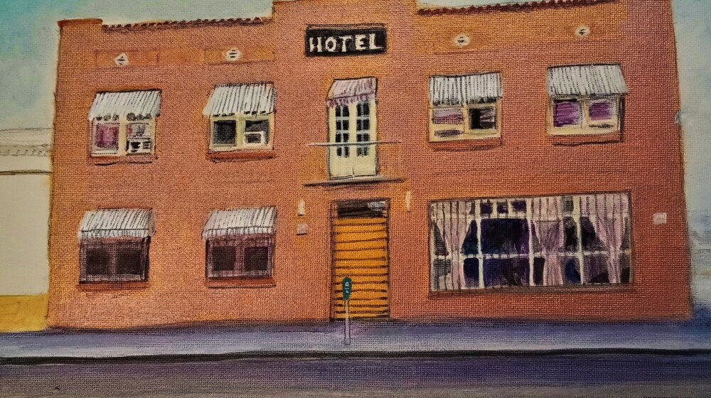 A painting by Gary Parcel of the St. James Hotel , built in 1928 and torn down in 2021 to be replaced with parking.