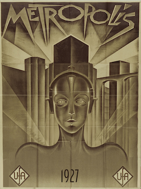 The movie poster image from the original Metropolis film, showing a robot in the foreground and the tall buildings of a city in the background.